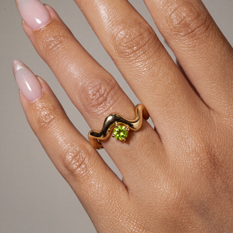 Wave-Twisted Peridot Ring