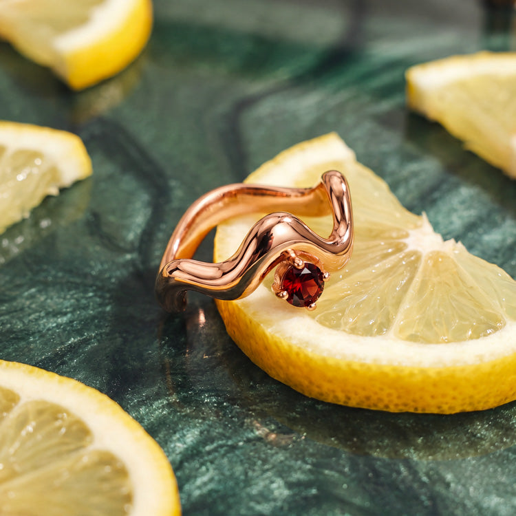 Wave-Twisted Garnet Ring